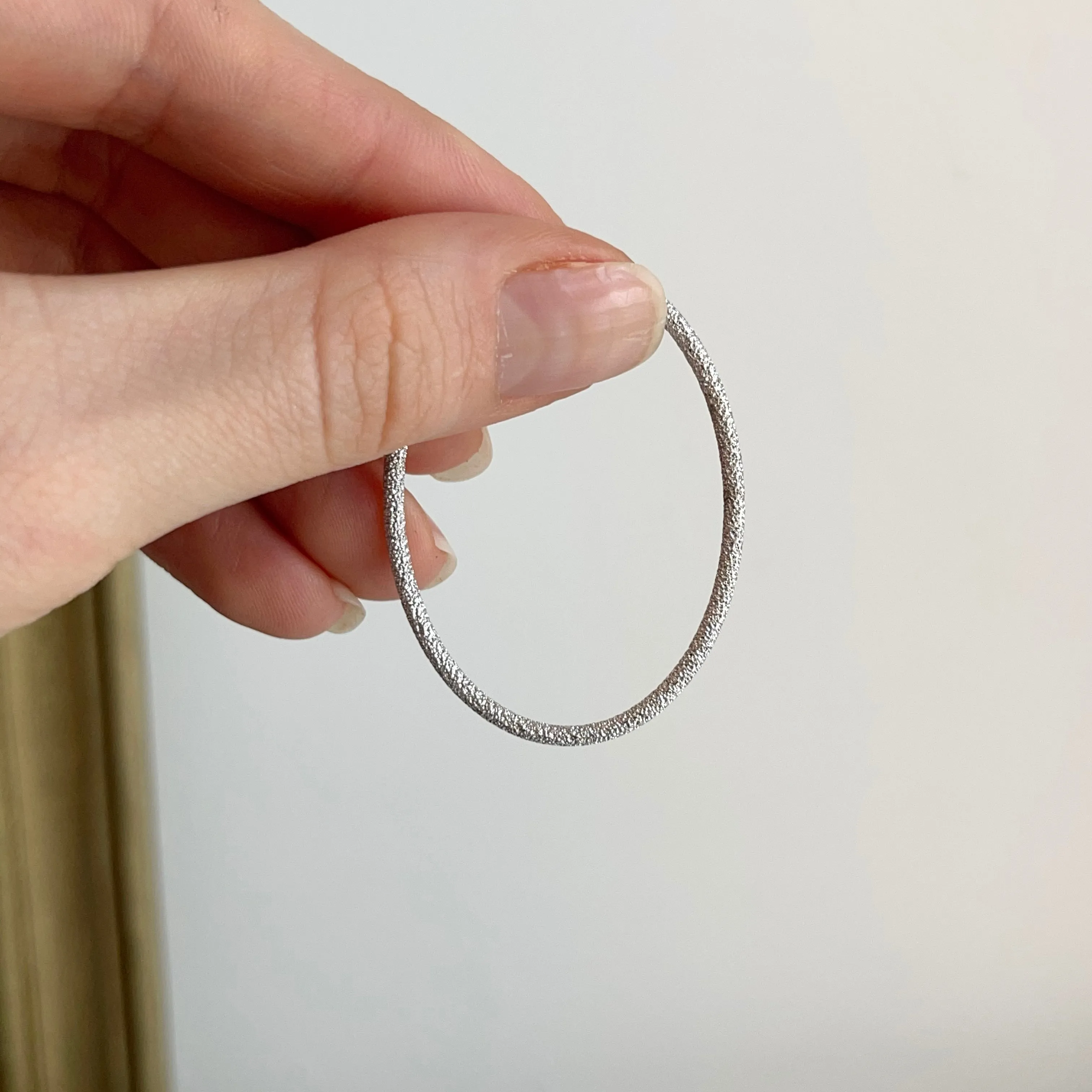 14KT White Gold Textured Tube Oval Hoop Earrings 46mm