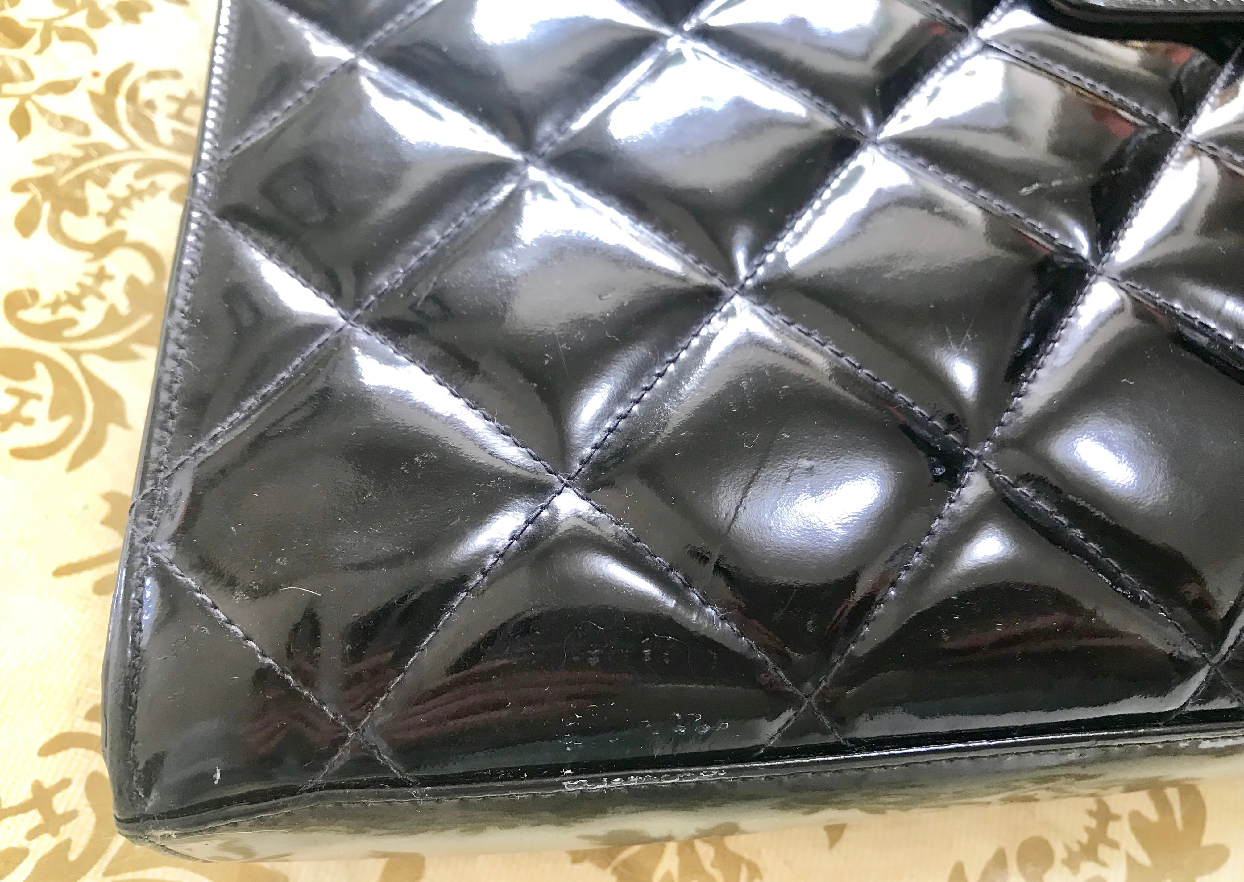 1990s. Vintage CHANEL black patent enamel briefcase business bag with golden large CC motif. Classic and traditional masterpiece you must have.