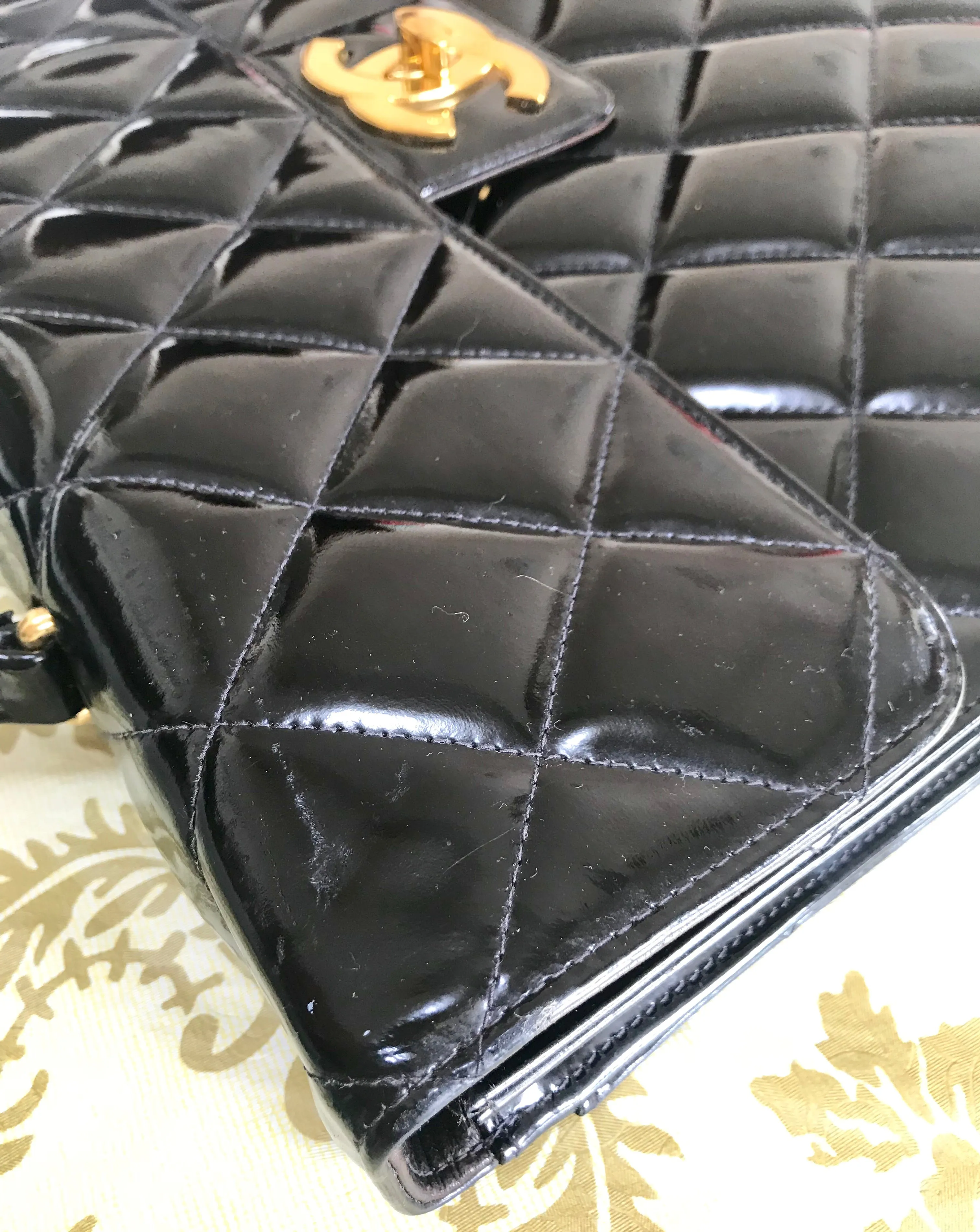 1990s. Vintage CHANEL black patent enamel briefcase business bag with golden large CC motif. Classic and traditional masterpiece you must have.
