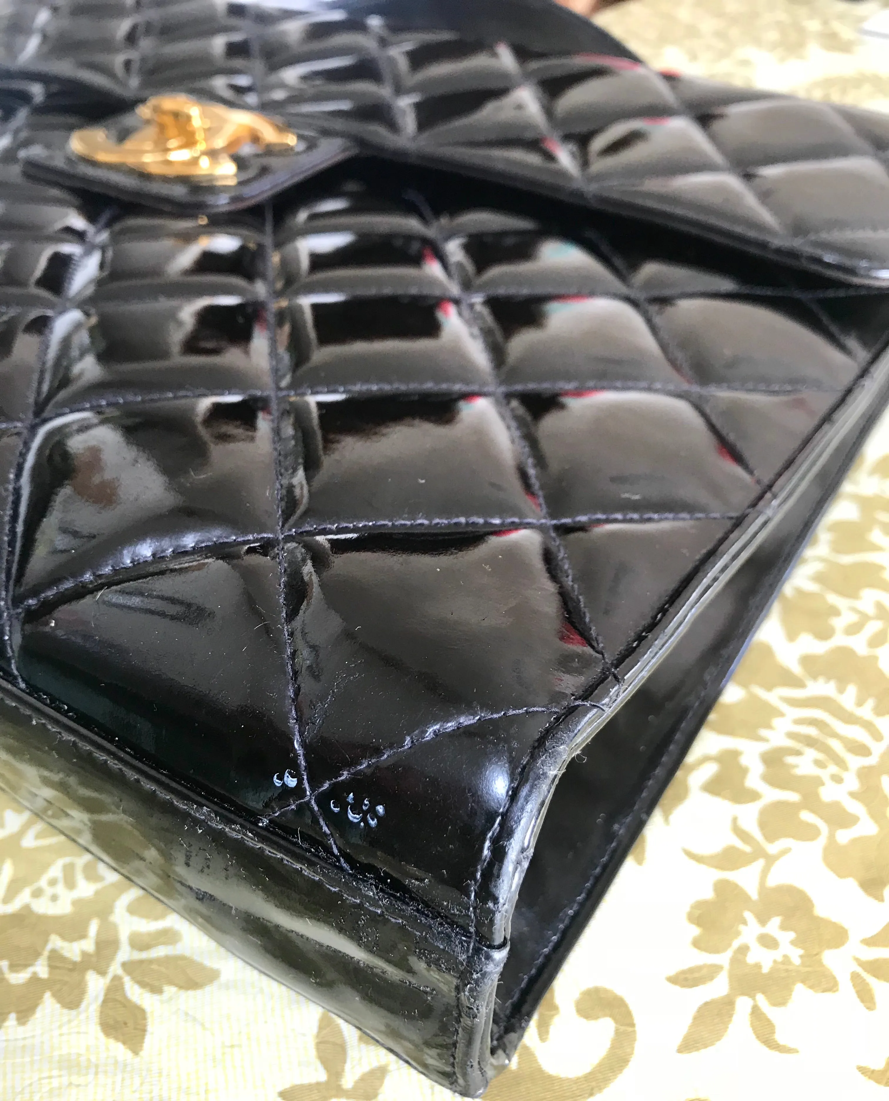 1990s. Vintage CHANEL black patent enamel briefcase business bag with golden large CC motif. Classic and traditional masterpiece you must have.