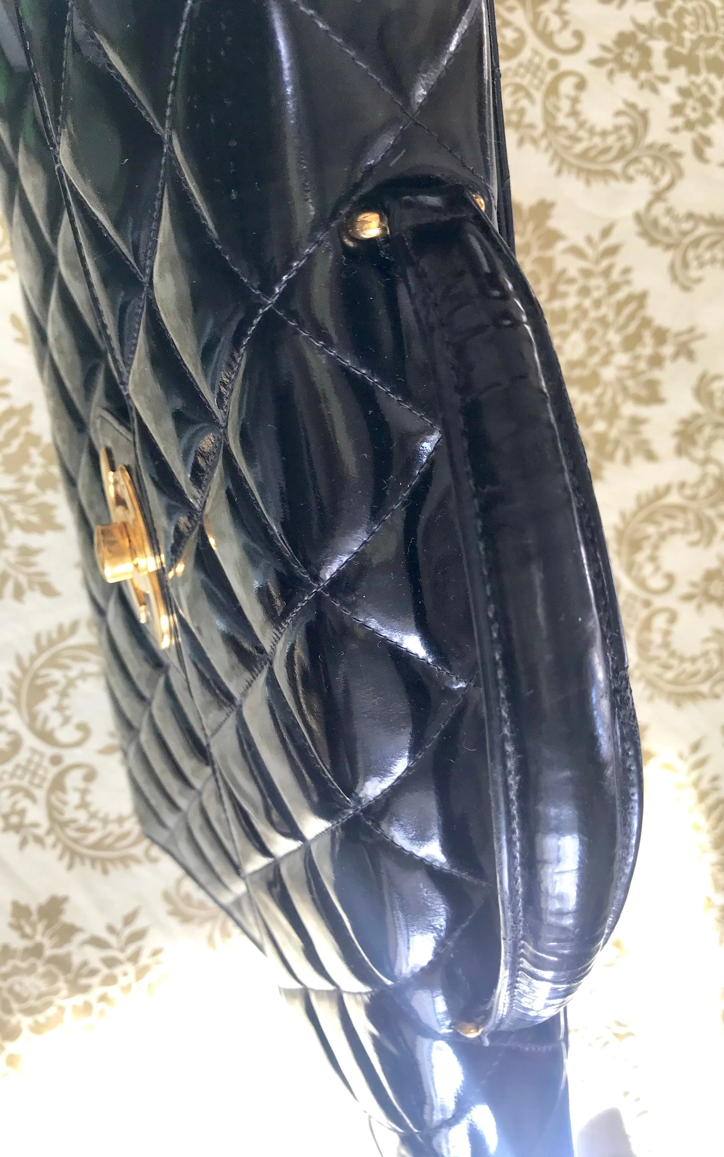 1990s. Vintage CHANEL black patent enamel briefcase business bag with golden large CC motif. Classic and traditional masterpiece you must have.