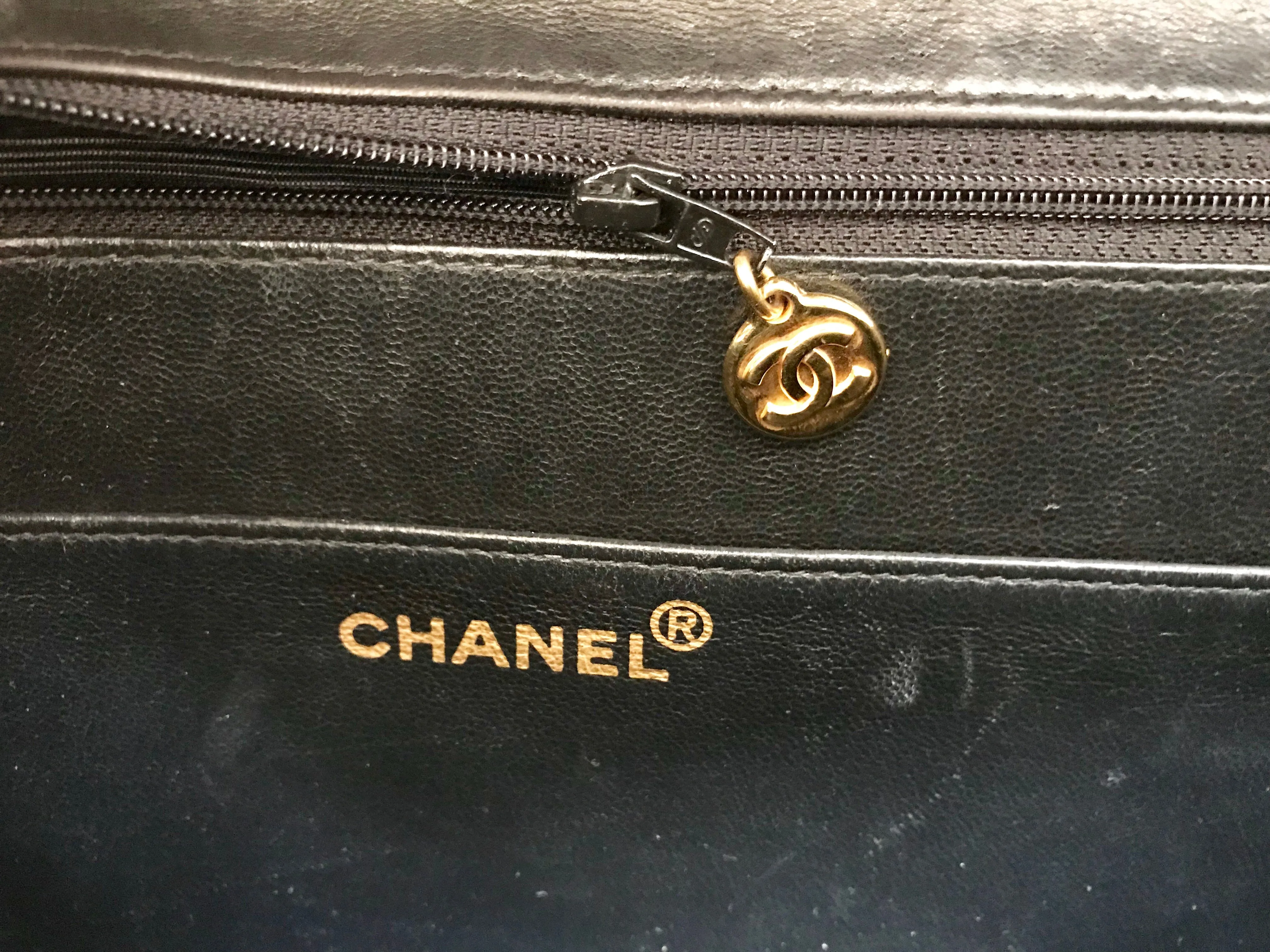1990s. Vintage CHANEL black patent enamel briefcase business bag with golden large CC motif. Classic and traditional masterpiece you must have.