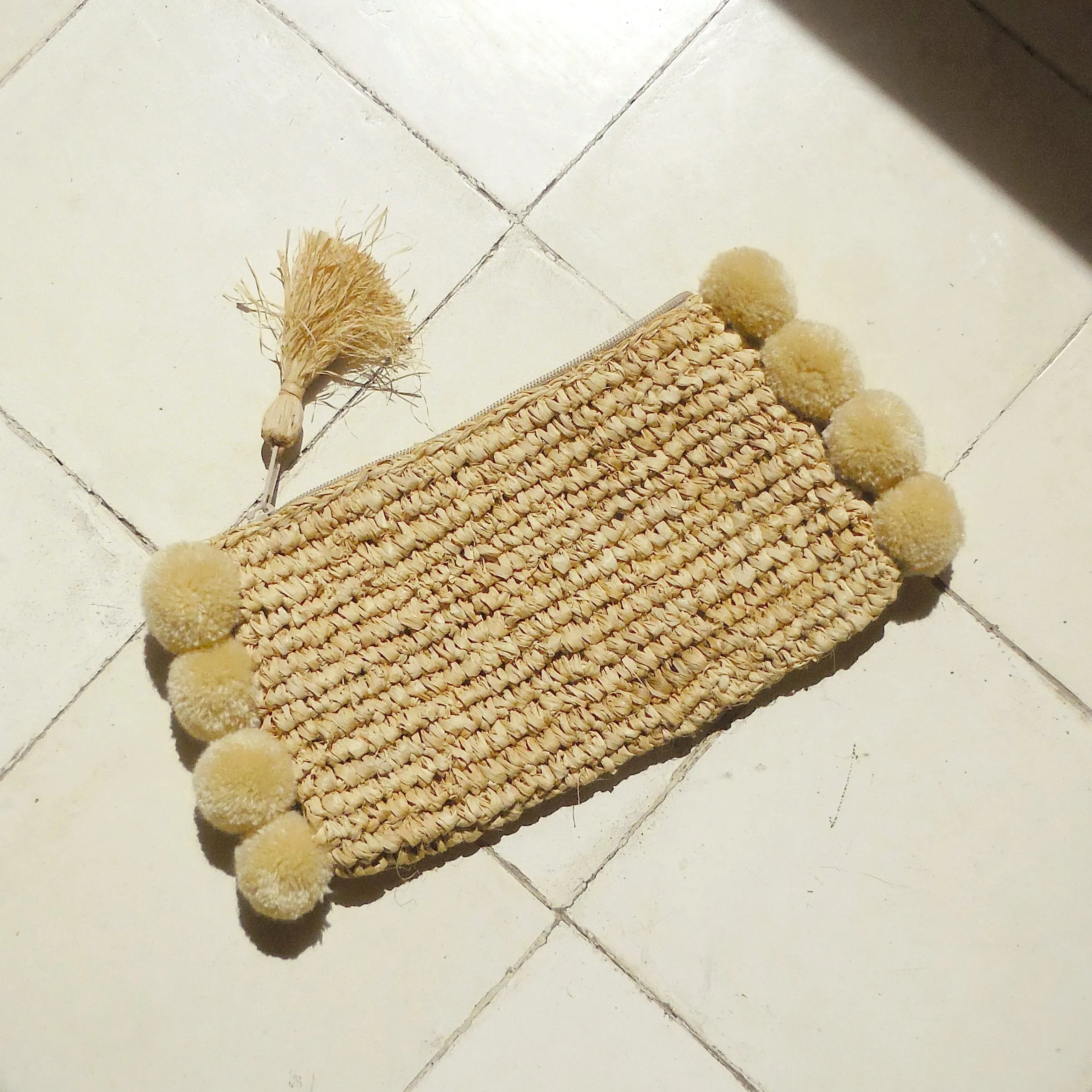 Brunna Canggu Woven Straw Clutch - in Natural Tan Raffia & Pom-poms