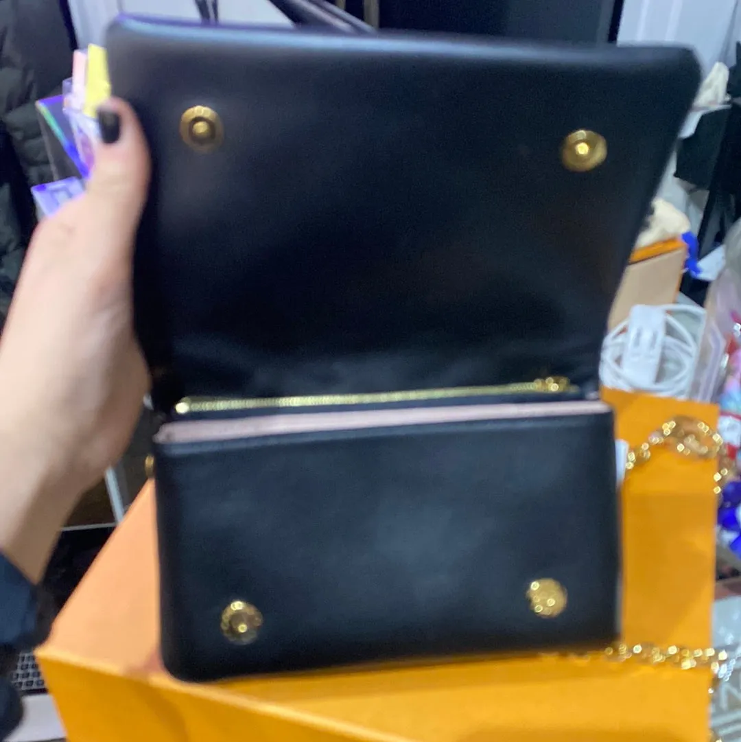Louis Vuitton Black Monogram Embossed Coussin Pochette