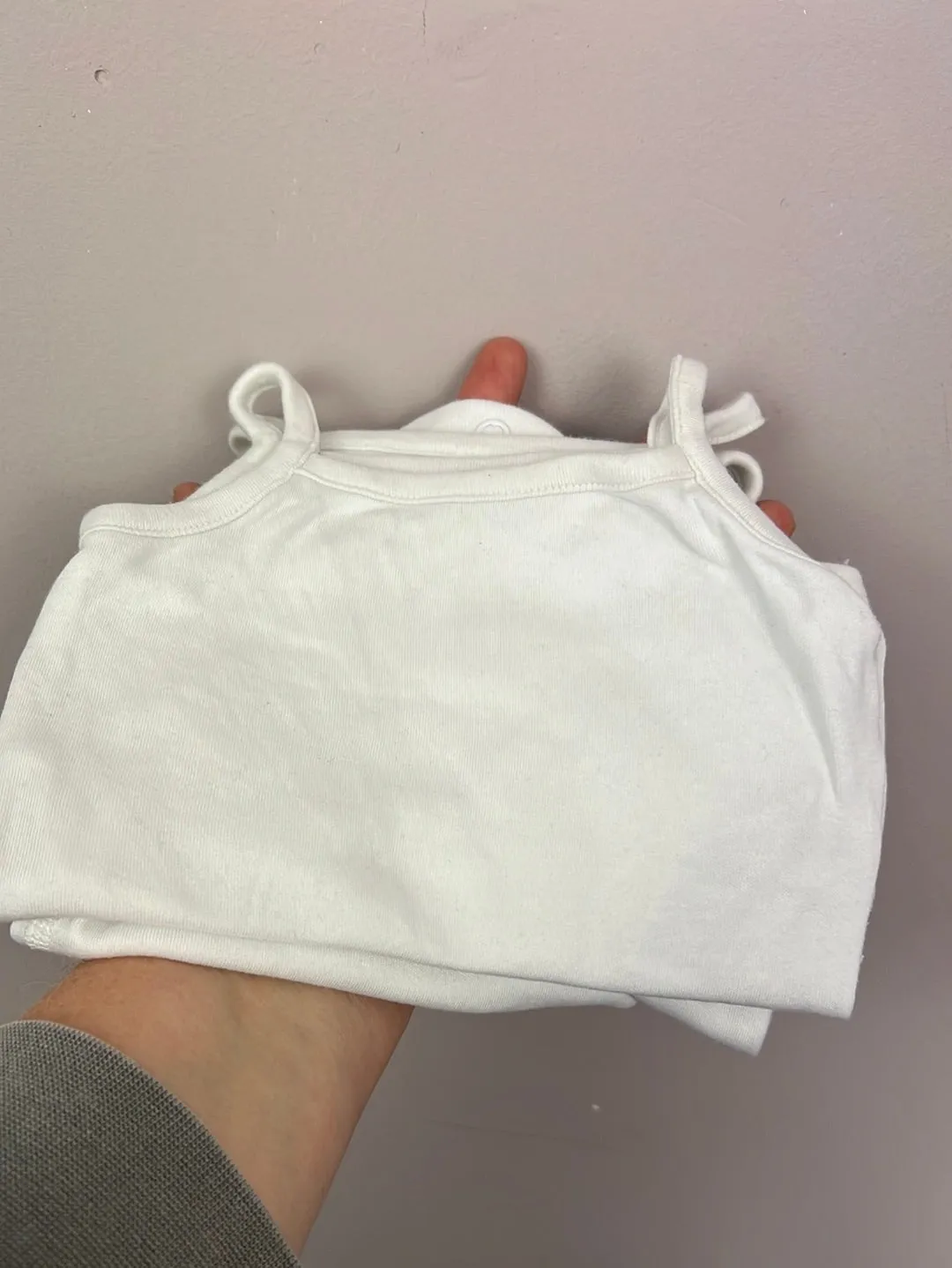 M&S white sleeveless bodysuits 1m