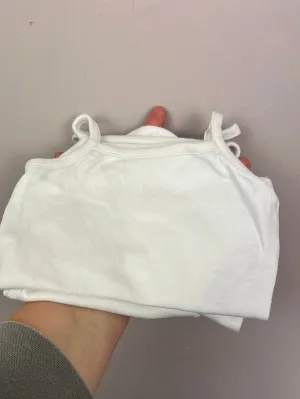 M&S white sleeveless bodysuits 1m