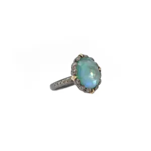 OVAL EMERALD AND CRIVELLI STATEMENT RING