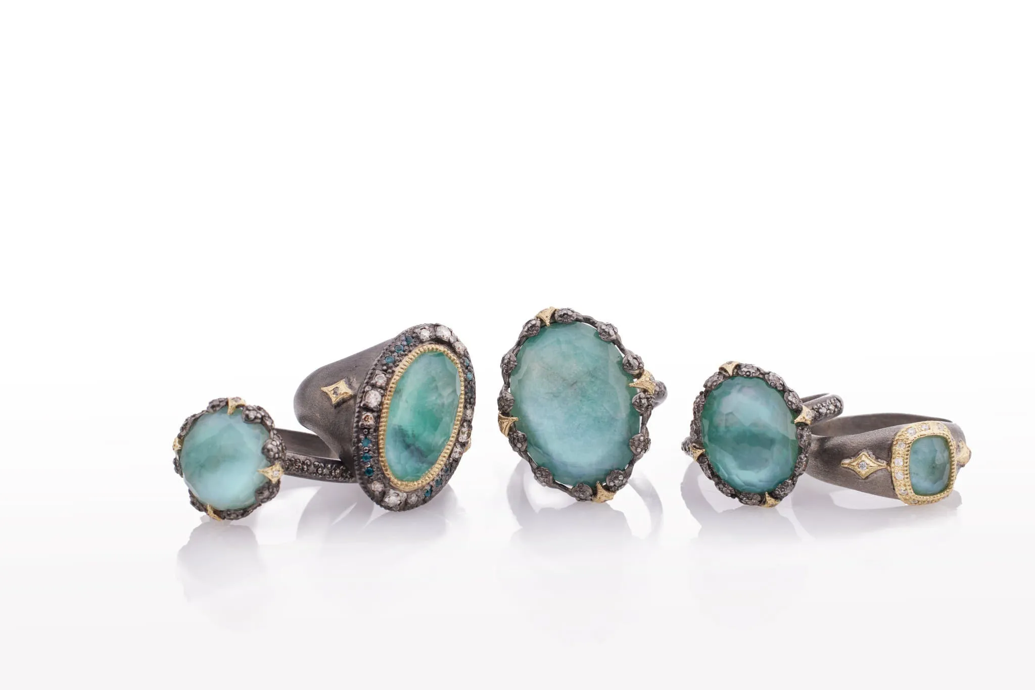 OVAL EMERALD AND CRIVELLI STATEMENT RING