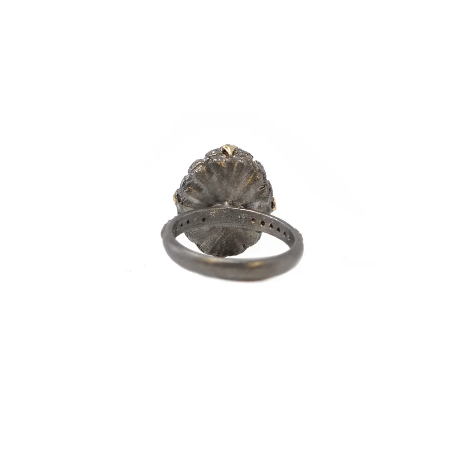 OVAL EMERALD AND CRIVELLI STATEMENT RING