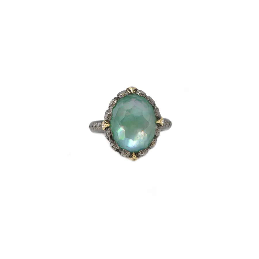 OVAL EMERALD AND CRIVELLI STATEMENT RING