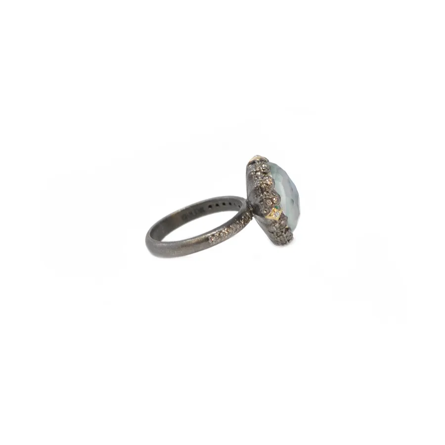 OVAL EMERALD AND CRIVELLI STATEMENT RING