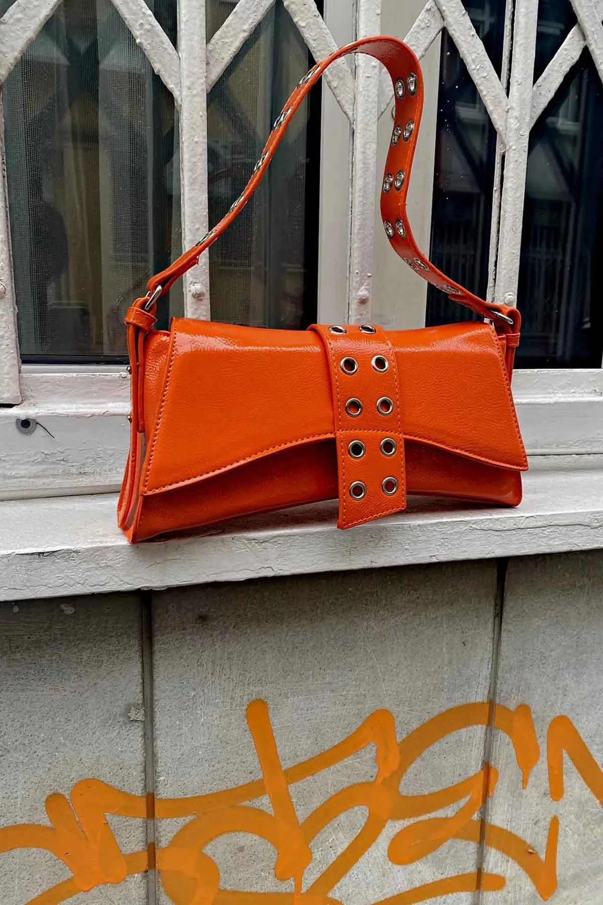Poison Asymmetrical Staple Baguette Bag
