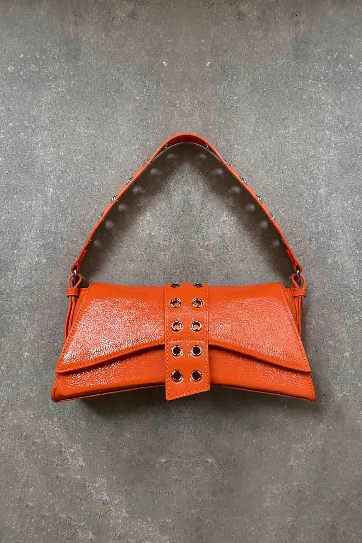 Poison Asymmetrical Staple Baguette Bag