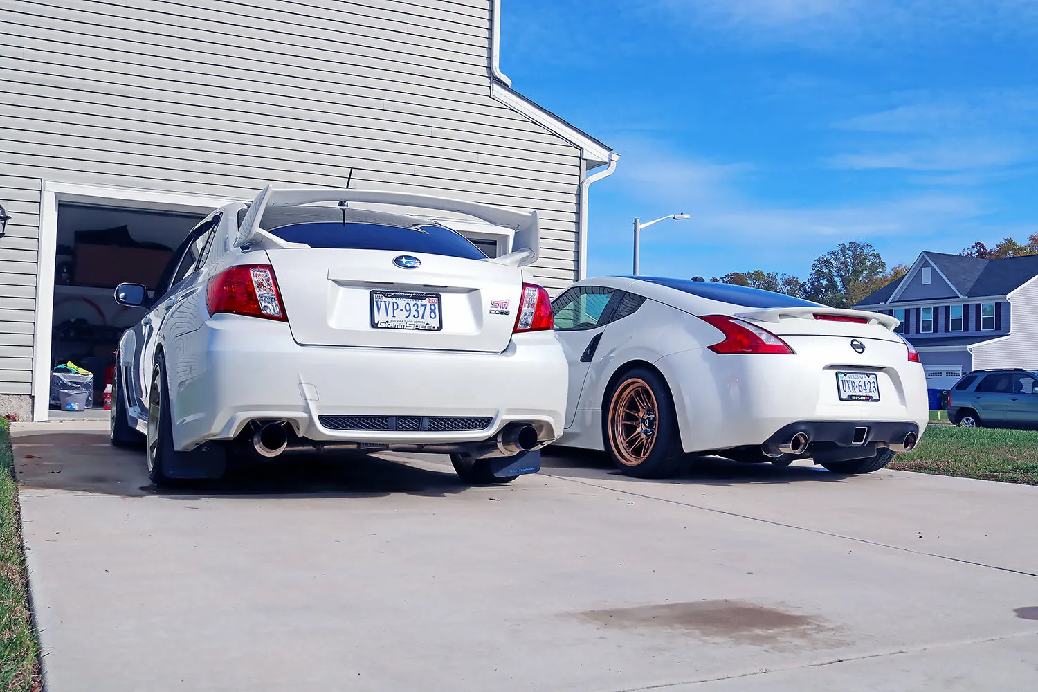 WRX STI and 370z In Driveway