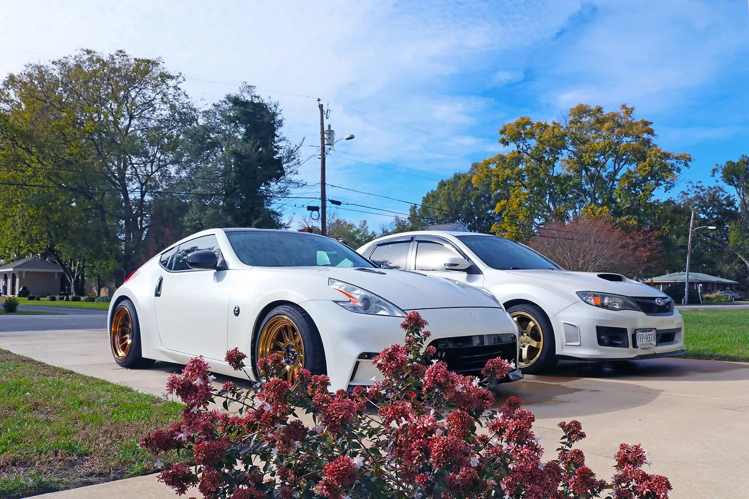 WRX STI and 370z In Driveway
